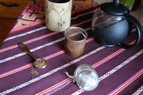 Loose tea with infusers, teapot, and mug